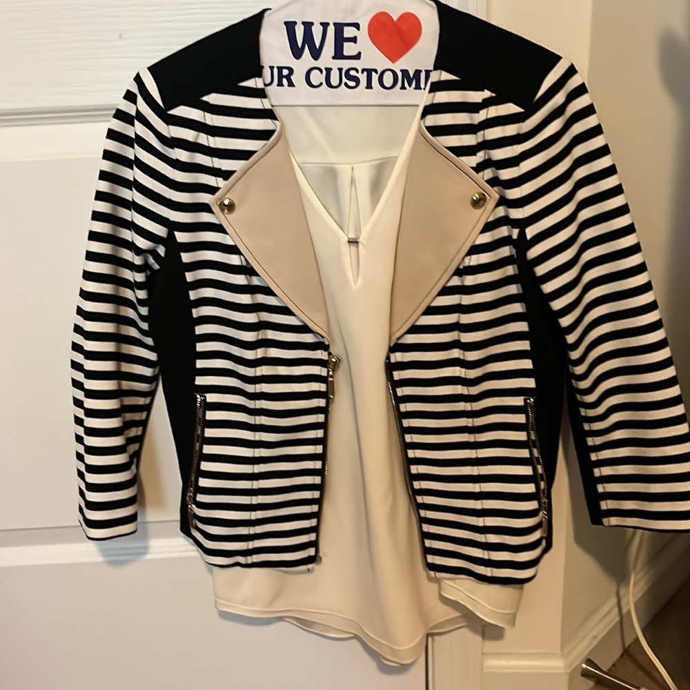 never worn zip front jacket , gold buttons on lapel tan lapel zip pockets